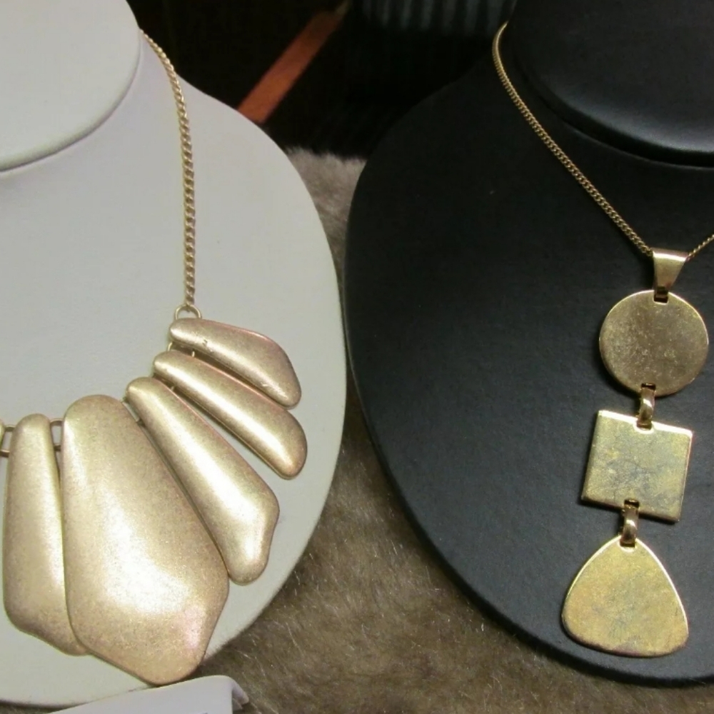 Two gold tone necklaces PM 413A